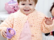 Free Huggable Baby Jacket Crochet Pattern from RedHeart.com