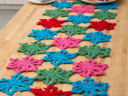 Free Snowflake Table Runner Crochet Pattern from RedHeart.com