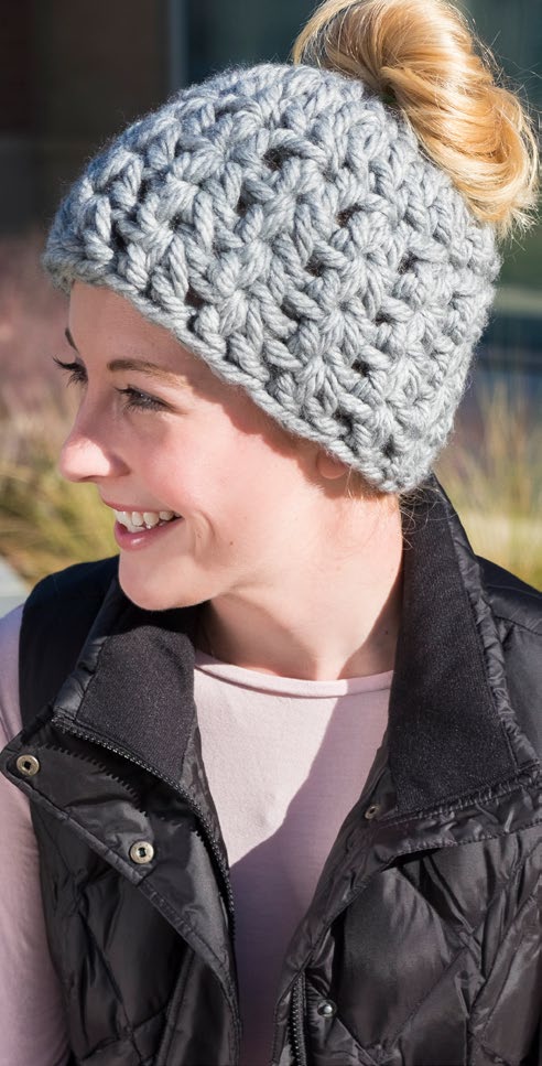 Free On-Trend Messy Bun Hat Crochet Pattern from www.RedHeart.com